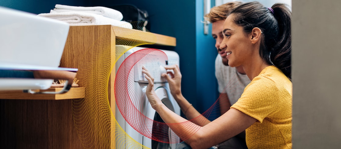 Two people are doing the laundry.