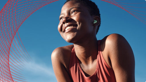 Smiling woman in front of blue skies