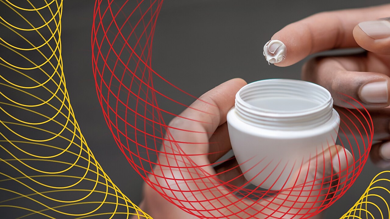 Hand with skin care cream