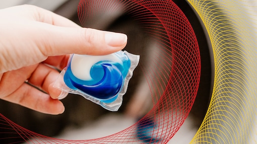 hand holding laundry pod