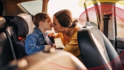 Mother and child in backseat