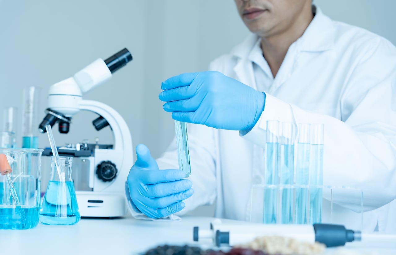 Scientist in a laboratory making formulations