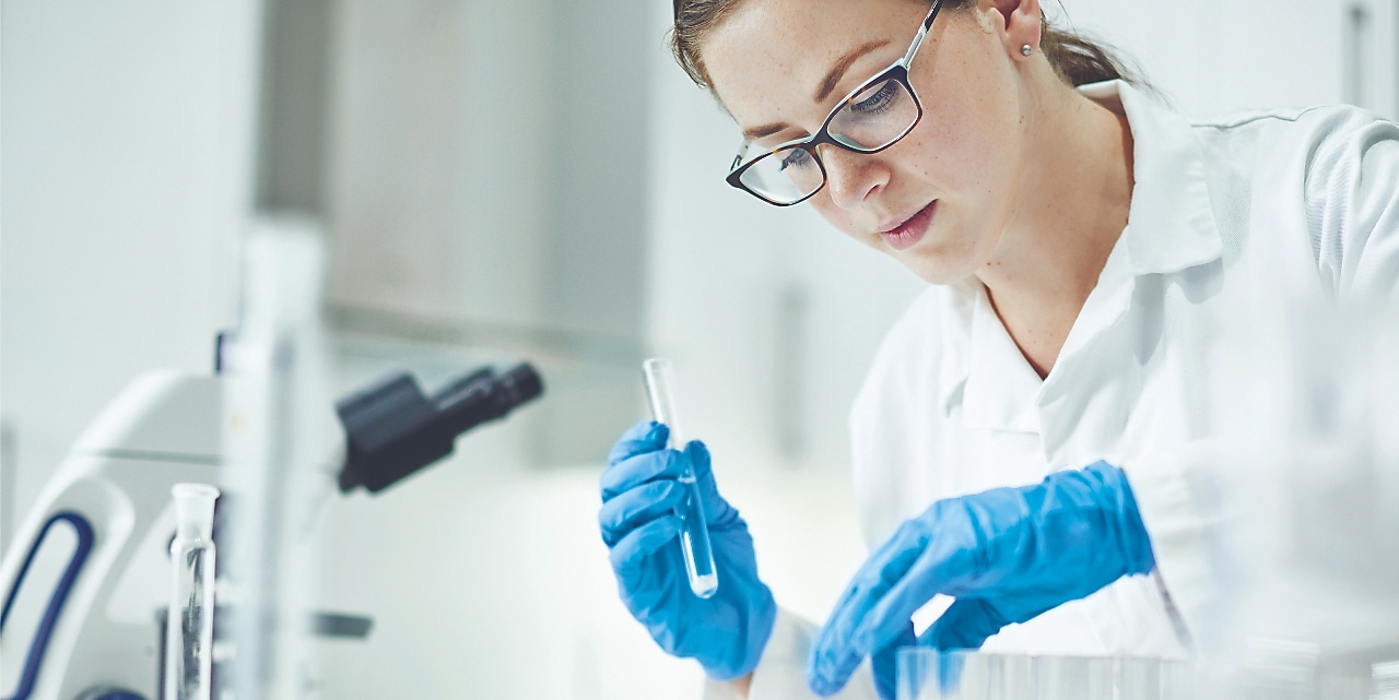 Scientist working with lab equipment