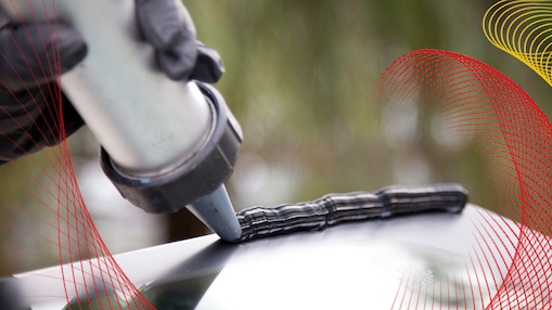 applying adhesive to surface