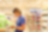 Person looking at bottle of detergent in grocery store