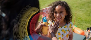 Mother applying sunscreen to child