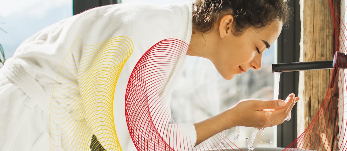 Woman washing her face