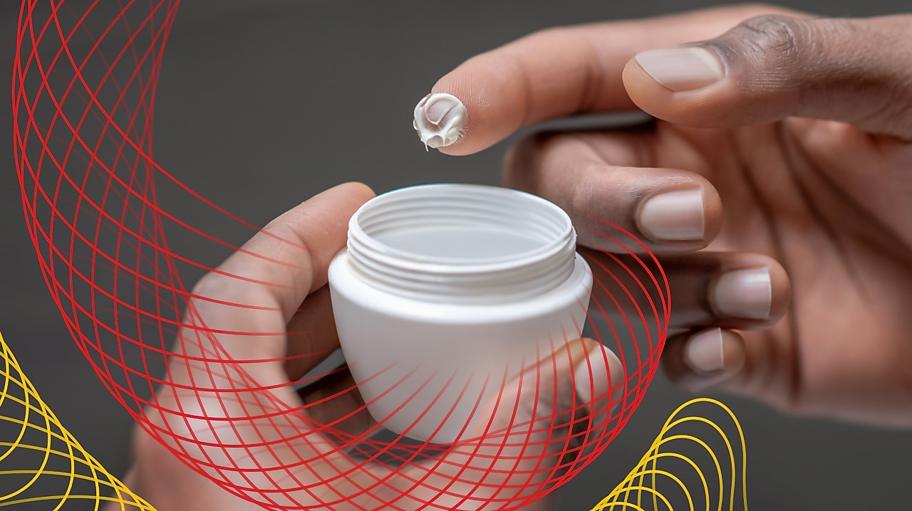 Hand with skin care cream