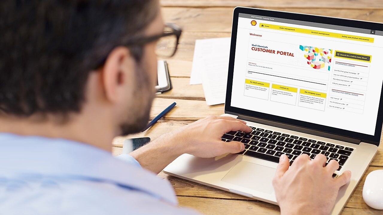 Customer visiting Shell Chemicals Customer portal on laptop