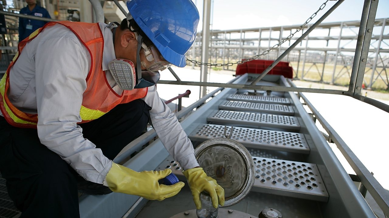 staff-loading-liquid-products-to-truck