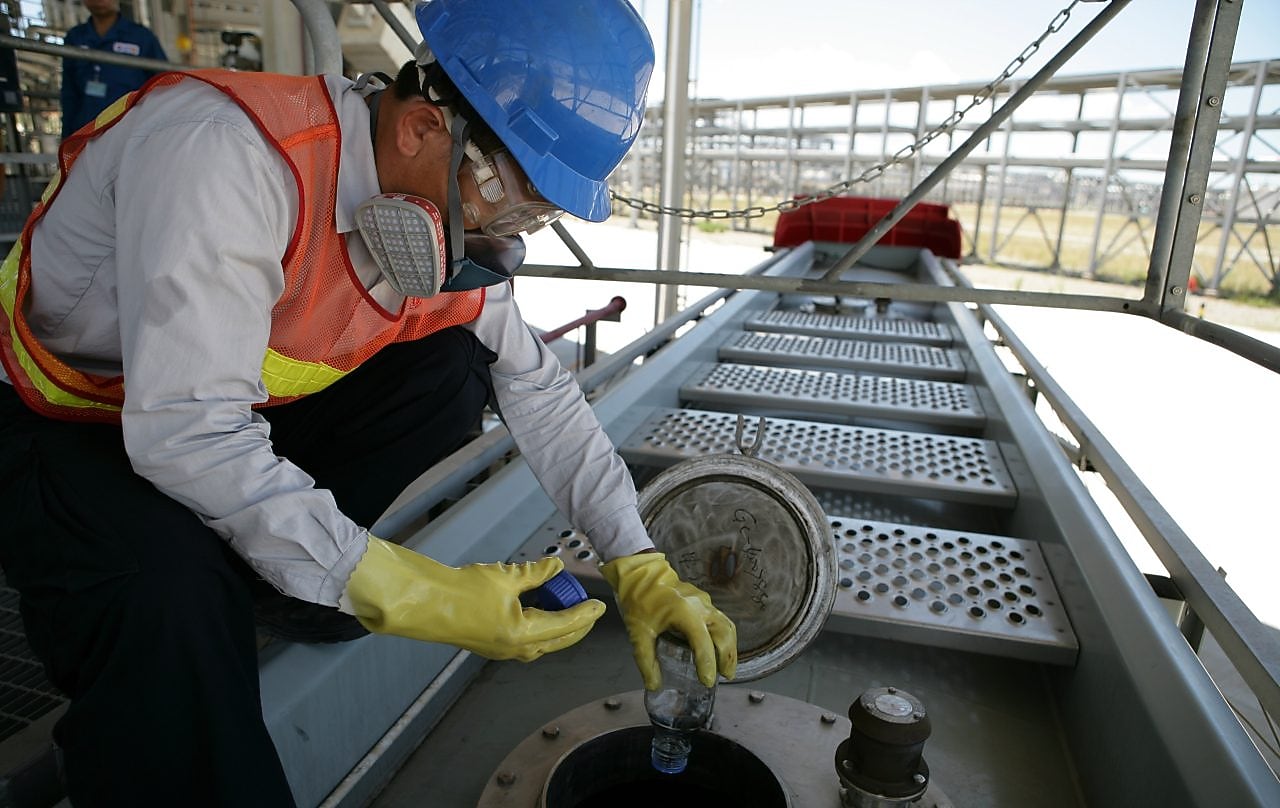 staff-loading-liquid-products-to-truck