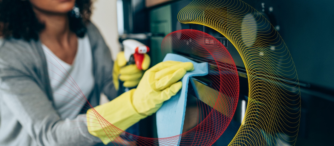 A woman cleaning the kitchen