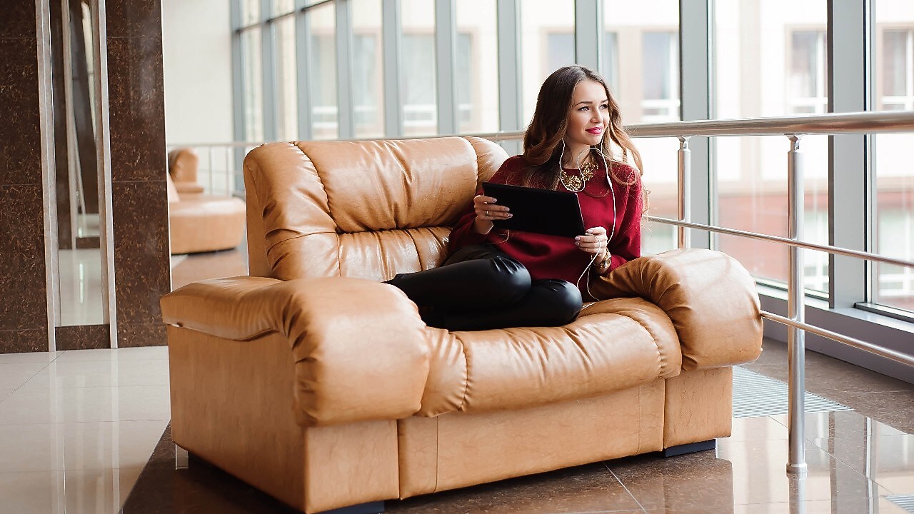 Lady sitting on couch