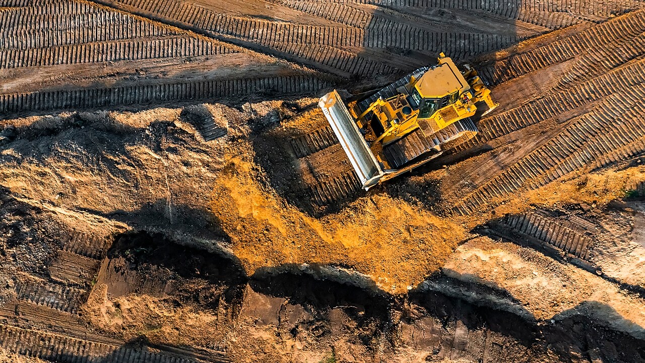 Bulldozer moving earth