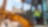 Female construction worker operating an excavator machine