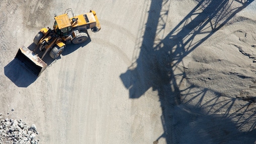 A birds eye view shot of a digger on a site