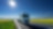 A truck driving down a sunny country road