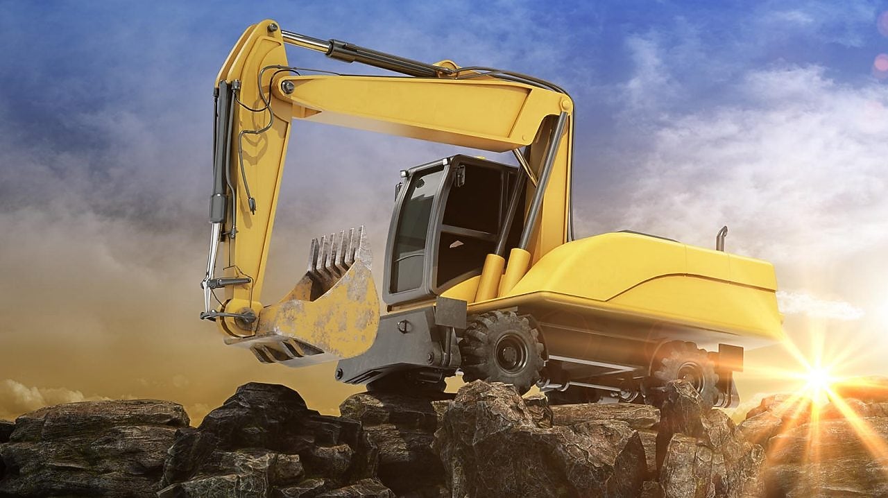 Two construction vehicles