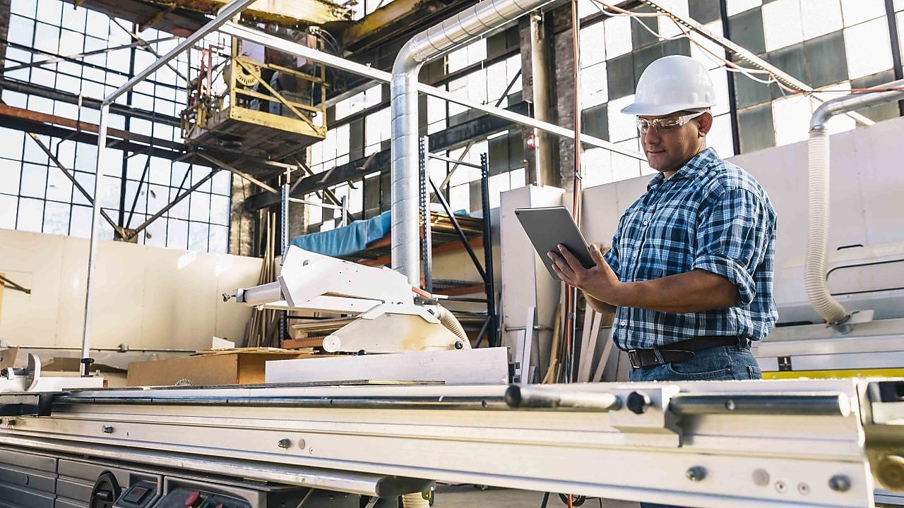 Construction Engineer using Tablet Computer