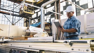 Construction Engineer using Tablet Computer