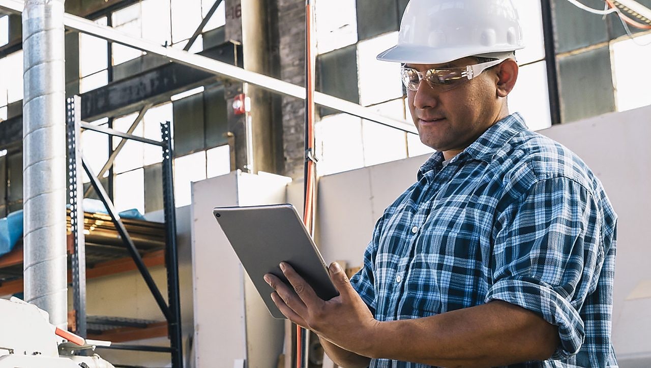 Construction Engineer using Tablet Computer