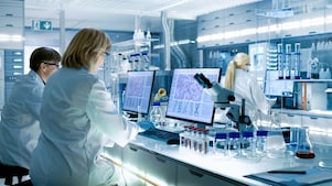 Lab worker using a computer