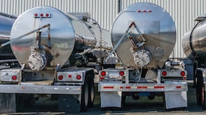 The back of two fuel tankers