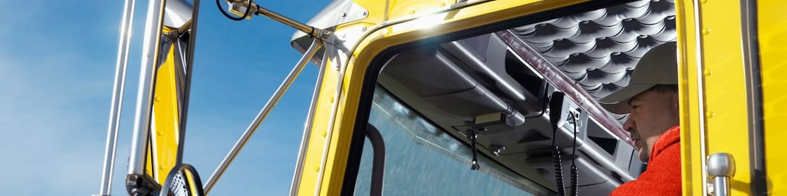 Man driving an articulated vehicle