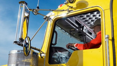 Man driving an articulated vehicle