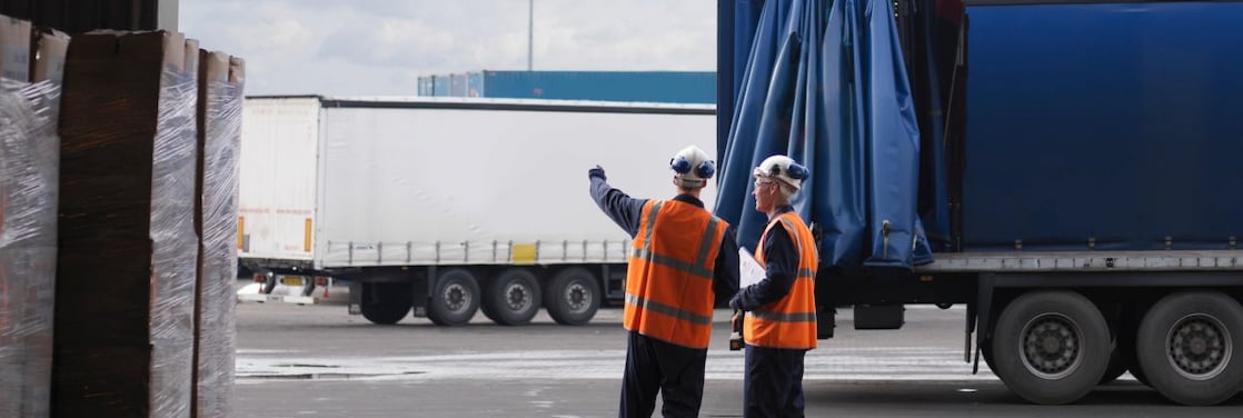 workers standing near trucks