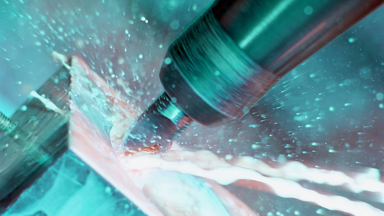 Close up of drill bit in action