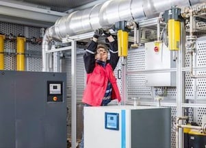 Worker servicing compressor system