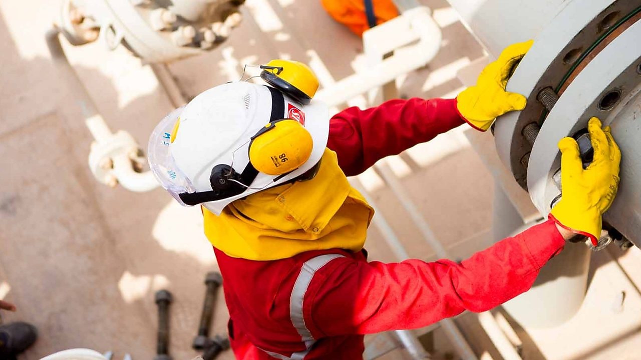 Engineer working on big pipeline