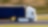 Image of white and blue van on the highway