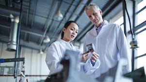 Scientists working in laboratory