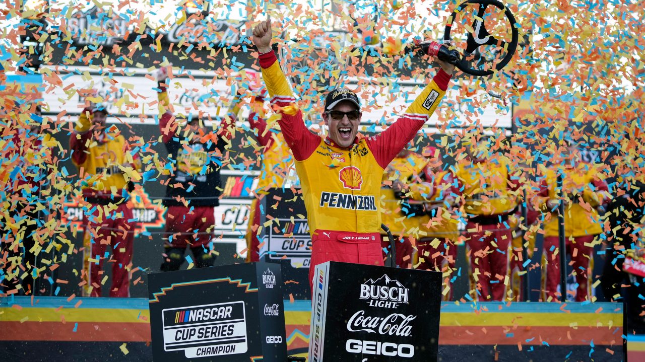 logano celebrates victory In confetti