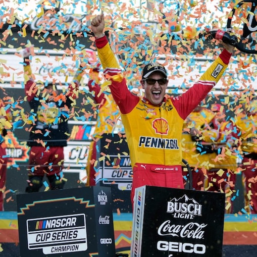 logano celebrates victory In confetti