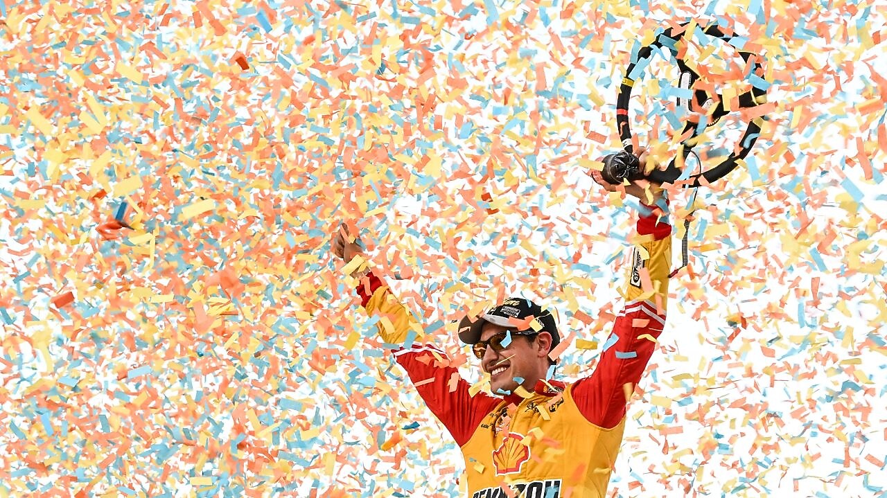 logano celebrates victory lap
