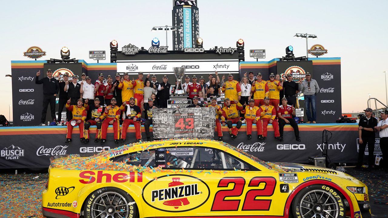 Logano celebrates victory with crew