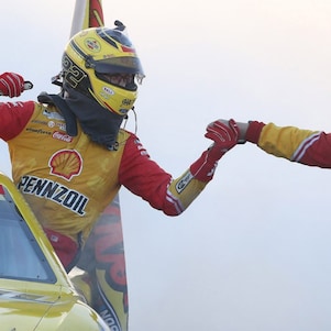 Logano celebrates victory with team