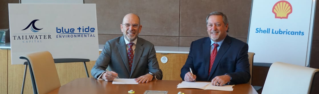Mark Bouldin, chief executive officer of Blue Tide (L) and Steve Reindl, senior vice president for Shell Lubricants Americas, signed the agreement in Houston, Texas
