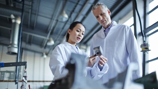 Scientists checking equipment