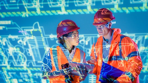 Looking through a screen of a tablet in a factory 