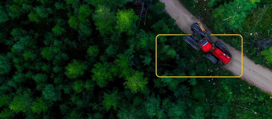 Birdseye view of tractor working in a forest