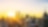 Sun rising in city landscape