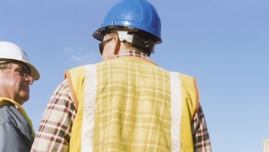 Men talking at the cement plant