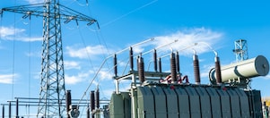 Pylon with a Transformer and the Shell Diala logo over it