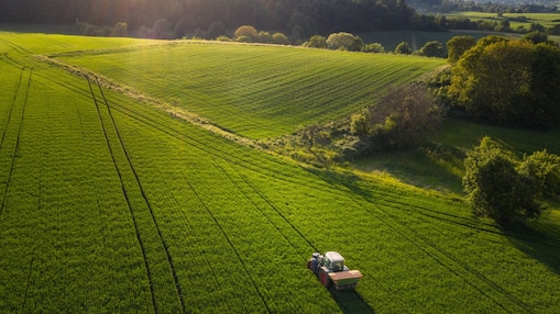 Tractor in field wide shot