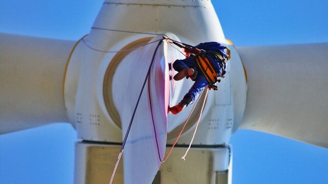 engineer up at turbine