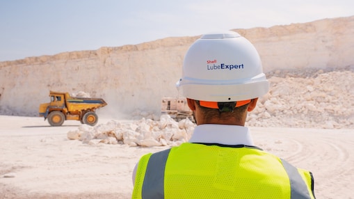 Man looking at cement truck